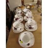 COLCLOUGH TEA SET DECORATED WITH ROSES, TOGETHER WITH TWO FOREIGN PORCELAIN CUPS AND SAUCERS