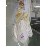 A Royal Worcester F G Doughty figurine tilted First Dance 3629