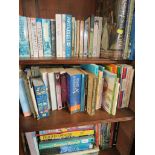 FIVE SHELVES OF FICTION AND REFERENCE BOOKS.