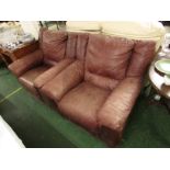 PAIR OF LARGE TAN LEATHER ARMCHAIRS