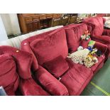 RED UPHOLSTERED SUITE COMPRISING TWO-SEATER SOFA AND TWO ARMCHAIRS