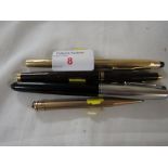 Two Parker fountain pens, Cross ballpoint pen with gold-plated body, and a gold-plated Lady Yard-o-