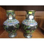 Pair of cloisonne vases, black ground with floral decoration, height 25.5cm
