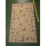 PALE GREEN GROUND HAND STITCH WOOL CHAIN FLOOR COVERING WITH PURPLE FLOWER DESIGN (150 X 88 CM)