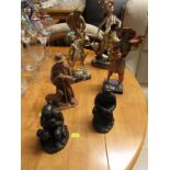 SEVEN WOODEN AND COMPOSITE DECORATIVE FIGURINES INCLUDING LEONARDO COLLECTION CLOWN AND ITAILIAN