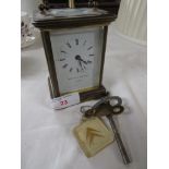 Matthew Norman brass case carriage clock, presentation engraving to back, with key