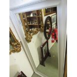 LARGE RECTANGULAR WALL MIRROR IN A CREAM PAINTED FRAME