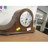 SMALL NAPOLEON STRIKING MANTLE CLOCK IN WOODEN CASE.