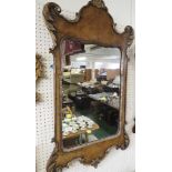 CHIPPENDALE STYLE SHAPED RECTANGULAR WALL MIRROR IN A WALNUT VENEER FRAME WITH CARVED ACANTHUS