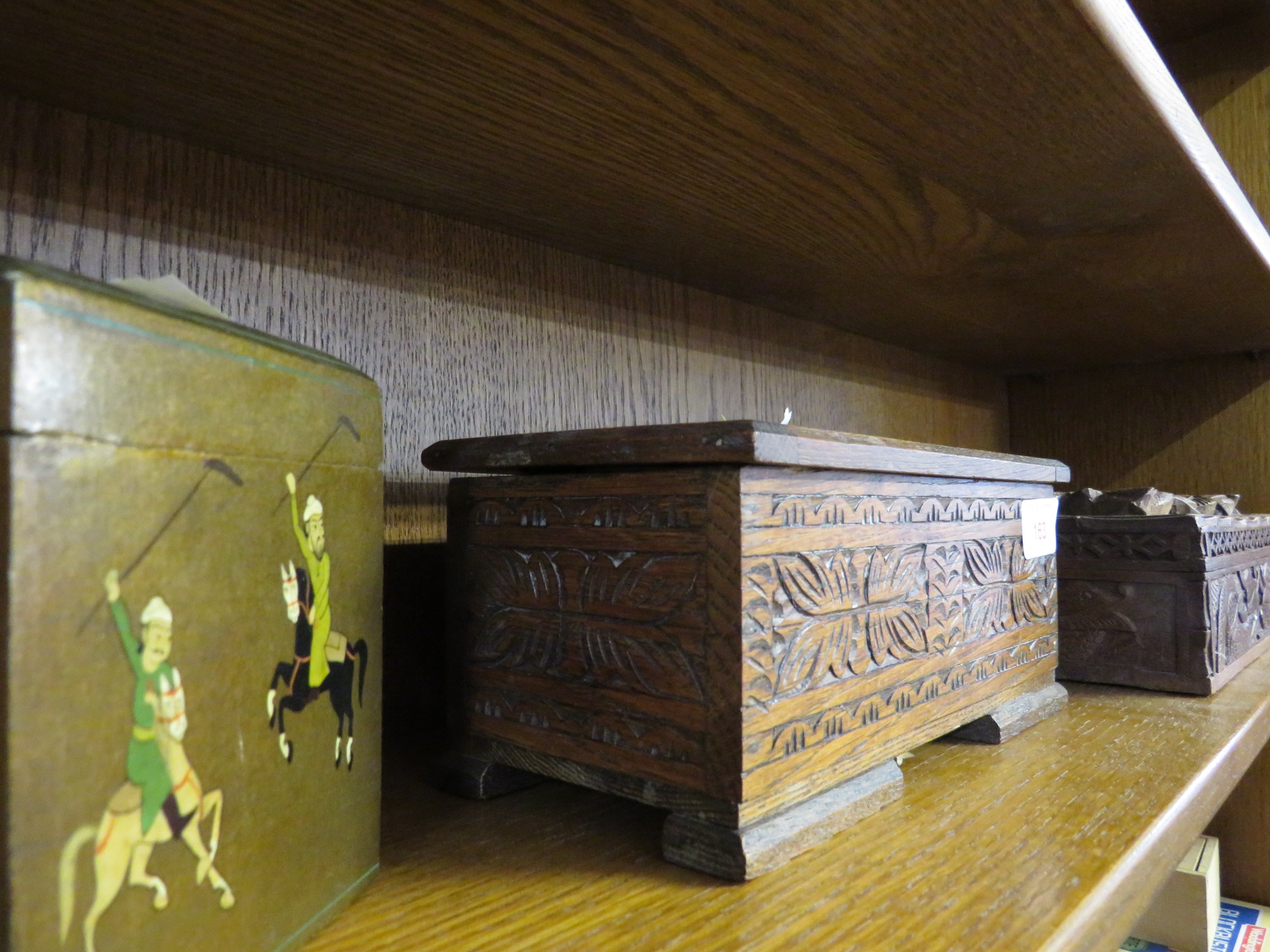 TWO CARVED WOODEN CIGARETTE BOXES, TOGETHER WITH PLAYING CARDS BOX.