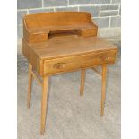 ERCOL LIGHT ELM WRITING DESK WITH TWO SMALL DRAWERS TO TOP SECTION AND SINGLE DRAWER BENEATH,