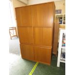 CHIPBOARD CUPBOARD WITH FOUR DOORS IN FAUX LIGHT WOOD VENEER, AND A MATCHING TWO-DOOR CUPBOARD
