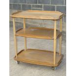 ERCOL LIGHT ELM THREE TIER TEA TROLLEY.