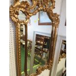 REPRODUCTION FRENCH STYLE LARGE WALL MIRROR IN A GILT EFFECT FRAME WITH ACANTHUS SCROLL MOULDINGS (