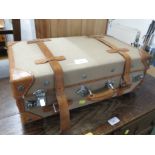 SMALL CANVAS COVERED AND LEATHER CLAD TRAVEL CASE. (AF)