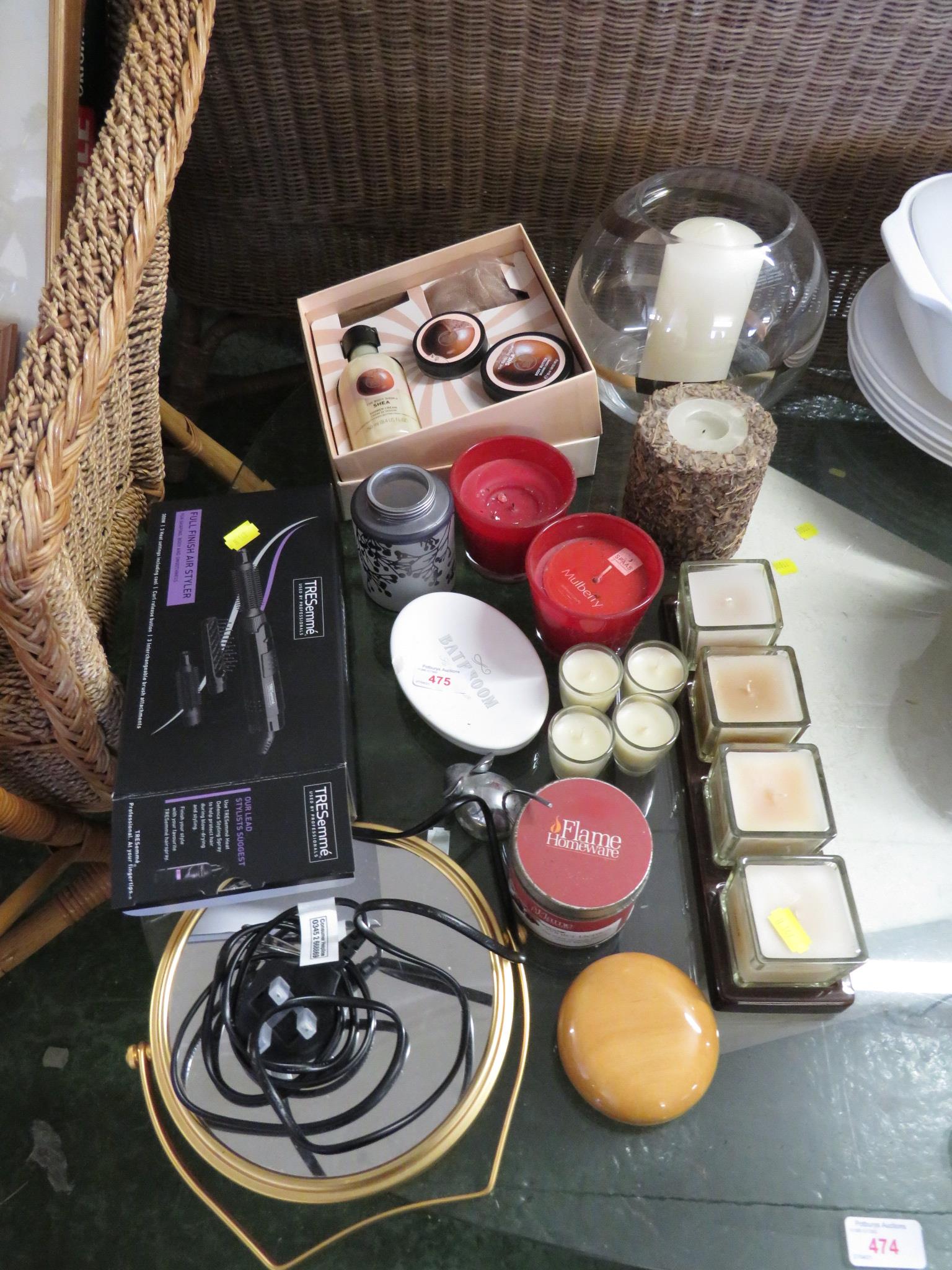 SELECTION OF CANDLES AND GROOMING PRODUCTS.