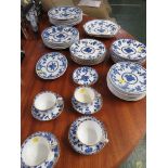 QUANTITY OF MINTON DELFT PATTERN DINNER AND TEA WARE INCLUDING PLATES, CUPS AND SAUCERS.