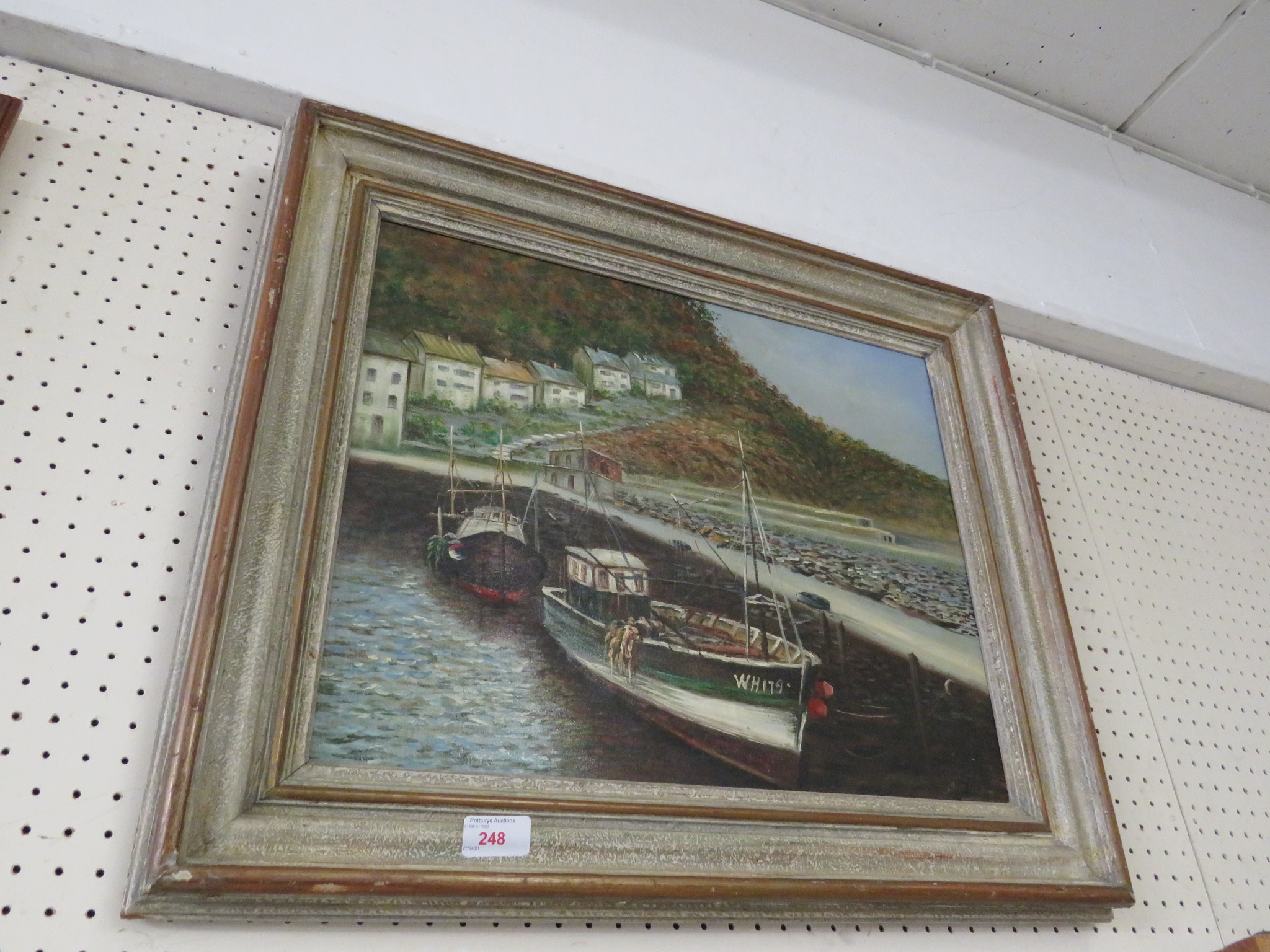 OIL ON CANVAS OF FISHING BOATS IN HARBOUR, SIGNATURE LOWER RIGHT, IN A WEATHERED FRAME