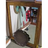 LARGE RECTANGULAR WALL MIRROR IN GILT EFFECT FRAME.