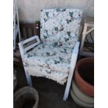 PAIR OF WHITE PAINTED METAL GARDEN CHAIRS WITH FLORAL CUSHIONS