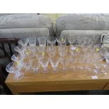 SELECTION OF STEMMED DRINKING GLASSES.