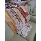 SELECTION OF VINTAGE EMBROIDERED TABLE COVERS, RUNNERS AND THROWS.