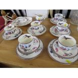 PARAGON CHINA PART TEA SERVICE DECORATED WITH FLOWERS AND BIRDS . (AF)