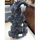 CAST IRON DOOR STOP IN THE FORM OF A JESTER.