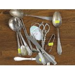 SILVER-PLATED GRAPE SCISSORS, FILIGREE SUGAR TONGS, AND AN ASSORTMENT OF CUTLERY AND SERVING WARE,