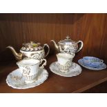 TWO SADDLER TEA POTS WITH GILT DECORATION, PAIR OF COPELAND CUPS AND SAUCERS WITH GILT DECORATION.