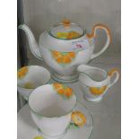 AYNSLEY CHINA SINGLE SETTING TEA SET DECORATED WITH FLOWERS.