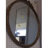 CIRCULAR WALL MIRROR IN GILT EFFECT FRAME