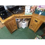 LIGHT OAK CORNER DESK WITH TWO CUPBOARD DOORS AND SINGLE DRAWER, KEYBOARD SHELF.