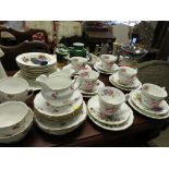 AYNSLEY CHINA DECORATED WITH FLOWERS AND OTHER TEA WARE.