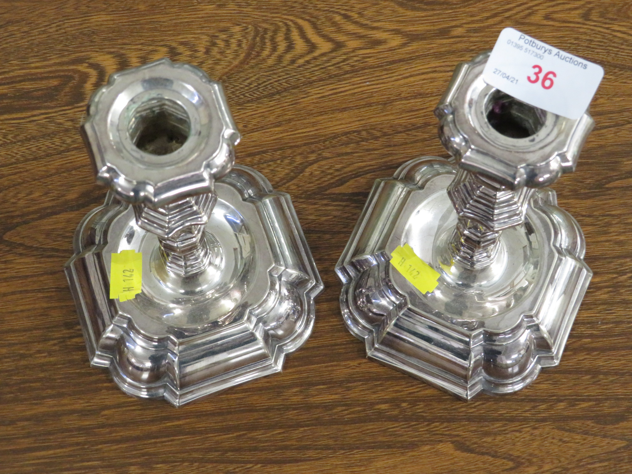 PAIR OF 830S WHITE METAL CLAD CANDLE STICKS WITH FILLED BASES, NEOCLASSICAL STYLE BALUSTER