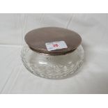 LARGE CUT GLASS DRESSING TABLE JAR WITH SILVER LID.
