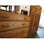 MID WOOD CHEST OF FOUR DRAWERS, TOGETHER WITH A MATCHING TALLBOY.