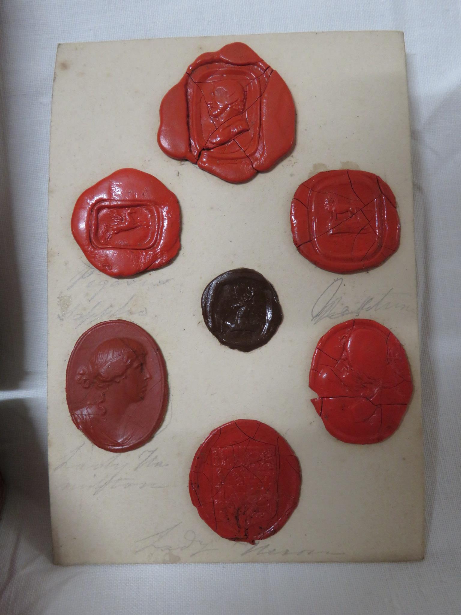 SELECTION OF ANTIQUE FOB SEAL IMPRESSIONS IN A LEATHER CLAD BOX. - Image 2 of 4