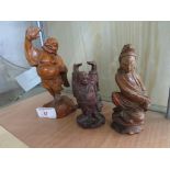 THREE CARVED WOODEN FIGURES OF DEITIES