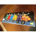 GLAZED CERAMIC WALL HANGING TILE DEPICTING MOPEDS.