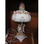 CONTINENTAL PORCELAIN TABLE LAMP DEPICTING DANCING CHILDREN ENCRUSTED WITH FLOWERS, PORCELAIN