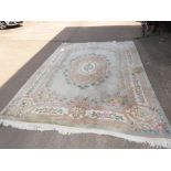 A LARGE RECTANGULAR CHINESE EMBOSSED RUG, PALE GREEN GROUND WITH FOLIATE PATTERNING (3.66 X 3.22