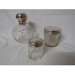 GLASS GLOBE SCENT BOTTLE WITH SILVER LID AND TWO CUT GLASS DRESSING TABLE JARS WITH SILVER LIDS.