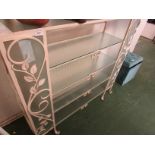 CREAM PAINTED WROUGHT IRON OPEN SHELF UNIT WITH FIVE GLASS OPEN SHELVES.