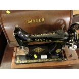 VINTAGE SINGER MANUAL SEWING MACHINE WITH WOODEN CASE.