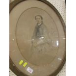 OVAL FRAMED AND GLAZED PORTRAIT OF A YOUNG WOMAN, SIGNED AND DATED IN PENCIL