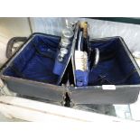 LEATHER CLAD FITTED TRAVEL VANITY CASE WITH CONTENTS OF SILVER BACKED HAND MIRROR AND BRUSHES, SCENT