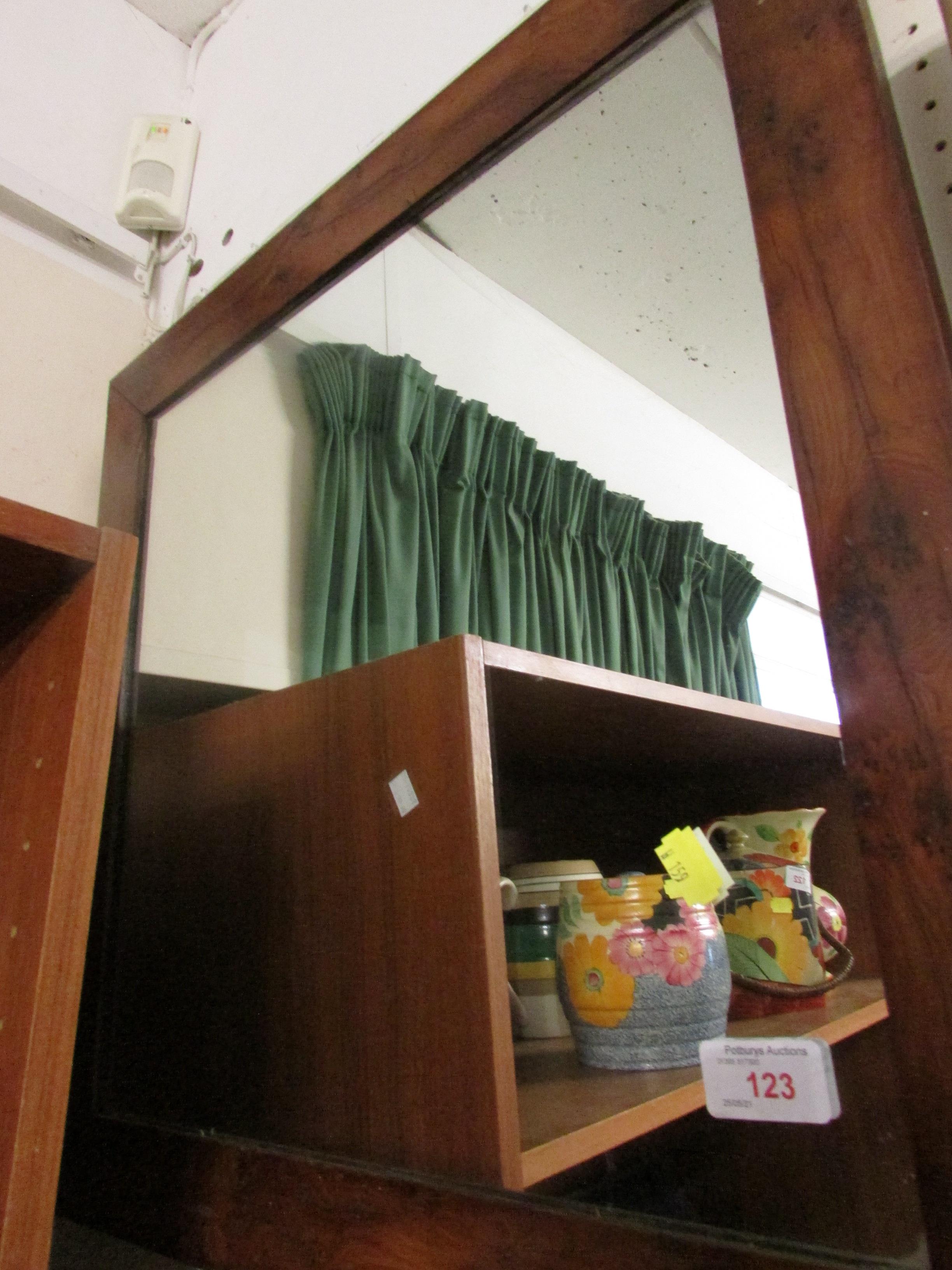 SQUARE WALL MIRROR IN A WALNUT FRAME.