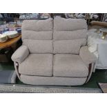 SMALL TWO SEATER SOFA IN GREY UPHOLSTERY.