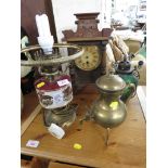 OIL LAMP STYLE TABLE LAMP , BRASS TEA POT WITH TAP. CANDLE LANTERN AND A MAHOGANY VENEERED CLOCK. (